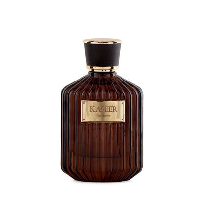 Brown perfume bottle with gold cap and 'Kaseer' label on a white background