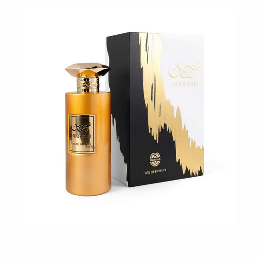 Gold perfume bottle with black and gold packaging on a white background